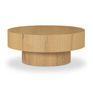 Meet the coffee table that holds the room together. Corey keeps things calm with a round silhouette that feels both timeless and current—ready for weeknight takeout