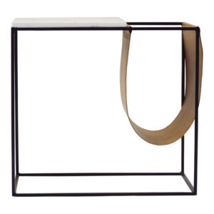 A side table that knows where the reading goes. A crisp white marble top offers a clean landing spot