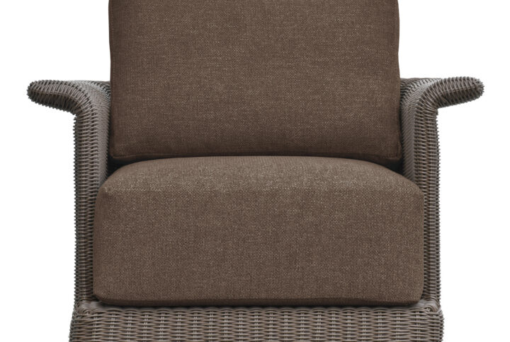 The Meredith accent chair's graceful tulip silhouette and curved armrests create visual interest