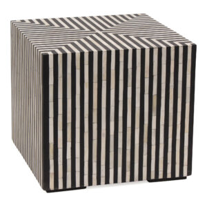 the Terning side table’s hypnotic art deco design is an exercise in contrast. A veneer of ethically sourced white and black camel bone with resin adds a visual statement that contrasts with its simple construction and square shape. The Terning series features a coffee table and a side table to better suit living spaces of all sizes and shapes.