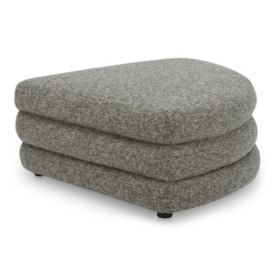 the Lowtide curved ottoman showcases a layered appearance that promotes comfort. Its vintage influence and understated elegance are enhanced by the use of textured fabric. On its own or combined as a modular sectional
