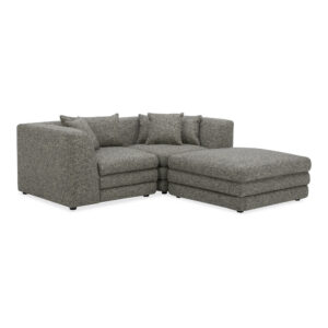 the Lowtide nook modular sectional configuration showcases a layered appearance that promotes comfort. Textured fabric enhances its vintage influence and understated elegance