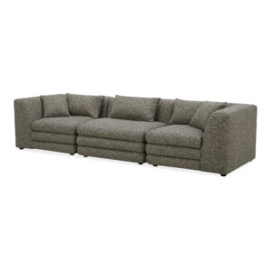 the Lowtide modular sofa configuration showcases a layered appearance that promotes comfort. Textured fabric enhances its vintage influence and understated elegance