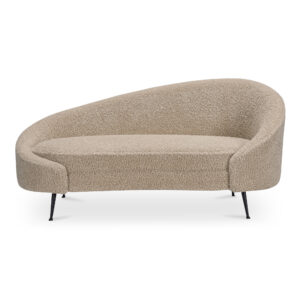 The Abigail chaise invites you to recline and savor the moment. With its asymmetrical back and faux shearling texture