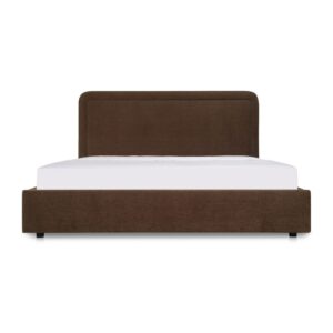 A bed with a hidden trick. The Simon Bed features a rounded silhouette with piped detailing