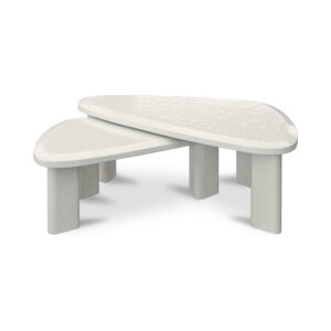 Concrete has a way of commanding attention—especially in a soft triangular silhouette like this. Sophie's nesting set pairs two solid concrete outdoor tables with rounded corners and gently angled edges that read sculptural and organic. A high-gloss cream lacquer finish adds warmth and highlights the material's subtle texture. Triangular legs echo the tabletop shape for a cohesive