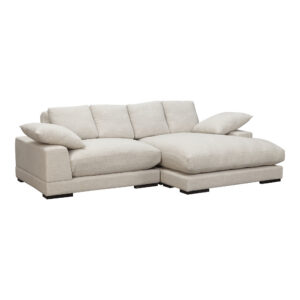 the Plunge sectional is masterfully crafted to maximize space and provide unparalleled relaxation. Its versatile flip chaise feature allows a left or right-side orientation that effortlessly adapts to create a sanctuary of style and repose