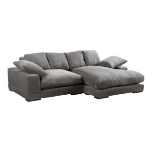 the Plunge sectional is masterfully crafted to maximize space and provide unparalleled relaxation. Its versatile flip chaise feature allows a left or right-side orientation that effortlessly adapts to create a sanctuary of style and repose