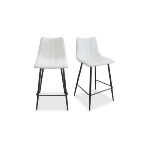 the Alibi counter stool features striking vertical line stitches that add subtle detail to its monochromatic design. A soft vegan leather seat is shaped to fit for comfort so guests can relax at the island or bar counter.