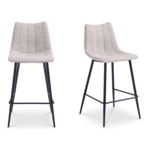 Contemporary modern counter stools get a new take with this sleek aesthetic. The Alibi counter stool features striking vertical line stitches that add subtle detail to its monochromatic design. A soft easy to clean performance fabric seat is shaped to fit for comfort so guests can relax at the island or bar