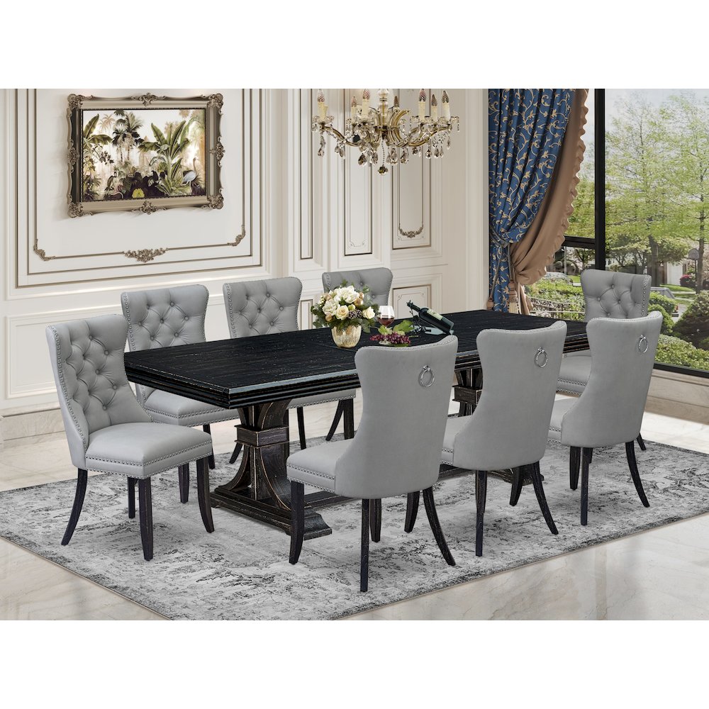 9 piece dining table set a dining table and 8 Faux Leather kitchen Chairs