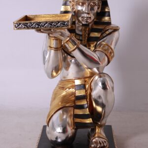 Our Kneeling King Tut with Tray Table measures 22.5 inches wide X 18 inches depth X 37 inches Tall and functional and decorative. It features authentic Egyptian details and will surely be a conversation piece in homes or businesses. The King Tut with Tray Table is Handcrafted of Fiberglass Reinforced resin and MDF. The finish is spectacular