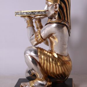 hand painted in a royal palette with gold and silver metal leaves that accent the authentic carved Egyptian details in dramatic color. This functional table creation can be used as an accent or side table. Sold separately but often ordered in pairs for balance or consider combining this with other Great Egyptian Memorabilia items brought to you from the Whimsical Treasure Collection