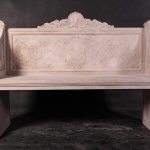 Enhance your outdoor or indoor space with this exquisite carved stone bench