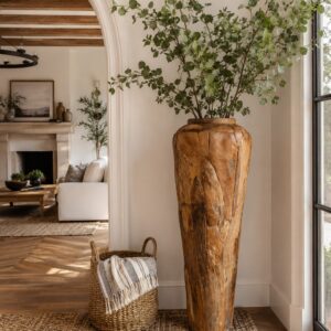 this stunning 48-inch vase showcases the organic beauty and rugged texture of reclaimed wood. Each piece is uniquely shaped by nature