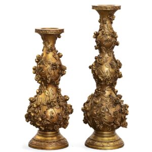 Add an elegant touch of timeless charm and golden sophistication to your home décor with the Golden Gardens 2 Piece Candleholder Set. Each piece is beautifully adorned with intricate floral detailing