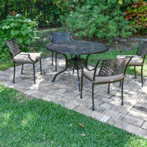 a comprehensive dining solution featuring a 48-inch round table and four matching Savannah Dining armchairs with Sunbrella Cushions that are stackable. This set epitomizes the elegance and functionality of the Savannah Collection