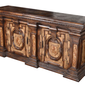 The Belruse Grand Buffet is the largest most impressive cabinet from our popular Belruse Series it stands a magnificent 97.5" wide and is 48" tall. This series boasts a Spanish influence with large scaled details and its multi layered finish of light and dark sienna and brown tones with subtle natural contrasts resulting from hand rubbing and exposing the rich wood undertones then delicately detailed with hand painted soft scrolls. There are many dramatic and beautiful buffets
