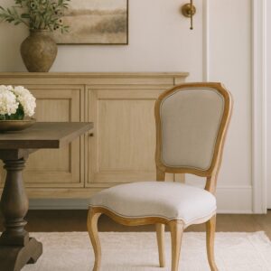 The Coastal Series. This expanding series is affordable yet appropriately fashioned for a more relaxed coastal life style. The style of the collection also can fit with farmhouse interiors as well as southern designed more rustic homes. The items are all hand carved and hand made using solid bleached pine from Indonesia. The chair offers padded upholstery seat and back cushions covered in a subtle linen. The item is sold separately and pairs perfectly with the Coastal Dining Table and or the Coastal Linen Arm Chairs or mix and match any of the items from the Coastal Series.