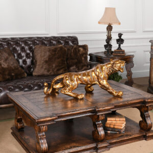 the hand carved details and staunched position depicted in the artists original carving adds to the power of the designed creation. It is hand cast in durable fiber resin