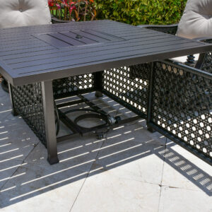 revel in the deep-seated comfort and dual motion swivel and rocking chair features while basking in the warmth and glow of the fire.  This 5-piece set boasts quality construction designed for years of enjoyment with minimal maintenance: - Aluminum Construction: Resistant to rust for enduring durability. - Welded Framing: Requires less assembly and ensures greater structural integrity. - All-Weather Cushion Covers: Quick-drying cushions covered in Sunbrella fabric for all-season comfort. - Poly Weave Accent: Enhances aesthetics with a rich touch and appearance. - Propane Table with Easy Glide Tank Holder (Tank Not Included): Features an easy-to-access ignition switch and propane volume knob for convenient operation.  The Monterey collection seamlessly blends interior styling with outdoor living.  From Bridgeton Moore Outdoor Furnishings the Monterey Fire Pit Conversation Chat set is made in aluminum and accented with UV split and crack resistant poly weave.  The poly weave construction accommodates expansion and contraction in various climates