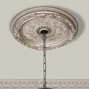 The Petite Round Champagne Ceiling Medallion 24 Inch Diameter is a classic round decorative ceiling Medallion or Coin. Finished in a softened Silver with a light wash of Gold