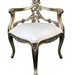 Hand carved out of solid Mahogany that is then tastefully finished in our Platina finish and upholstered with an imported beautiful Cream Taffeta fabric. Another exclusive design and finish from the Heritage Collection