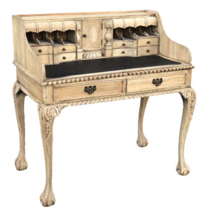 A wonderful English Chippendale style Hand Carved and Hand Finished desk uniquely finished in Natural Mahogany and great for a home or office. This Farmhouse Style Escritoire Desk recreation is 39 wide x 23 deep x 41 inches tall featuring all the classic Chippendale motifs including pie crust trim