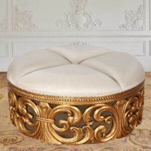 The Gold Rococo Ottoman with Cream Fabric is one of the more elegant Rococo Ottomans available. The design measures 46.5 inches Diameter X 21 inches Tall. Ottomans have increasingly been used to replace Cocktail tables in living rooms as well as nice additions to large walk in closets and bedrooms. This fashion is an example of a style of furnishings