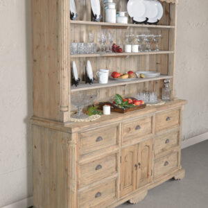 The Farmhouse Cote de Azur Hutch in Natural Finish is a large farmhouse style wall unit reminiscent of the style of the French Coastal Country Side. The large hutch features 6 drawers
