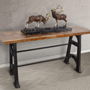 A beautiful and strong Wood and Industrial Iron Mango Parquet Console Table 60 Inch. The Console Sofa Table Top is built using Solid Mango hardwoods in an artistic parquet design. Naturally finished with a satin sheen that protects and enhances the wood for long term use. The grain of the Mango Wood offers beautiful variations of natural color with rich depth and tone. The top is mounted to an authentic Cast iron Industrial base that is heavy and stable. The base is hand cast in Iron using authentic Industrial molds. The complete table is beautiful and the strength of its construction will offer years and years of use for even the most active of families. Sold separately this console can be ordered and used separately. Consider combining with the matching Wood and Industrial Iron Mango Parquet Lamp Table 24 Inch or the matching Wood and Industrial Iron Mango Parquet Coffee Table 54 Inch to complete your desired design. Hand Made and Hand Finished in India for AFD Home. Minor Assembly Required.