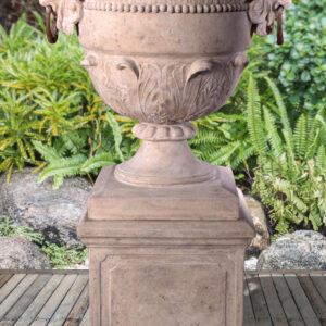 The Large Lion Urn on Base Stone Cast is a beautiful planter