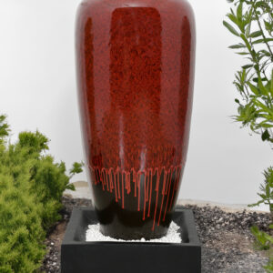the vase fountain is weather resistant and durable while being aesthetically beautiful.  Porcelain does not allow water to pass through the surface making it easy to clean and maintain for many years of useful enjoyment.  Available in Adobe Red
