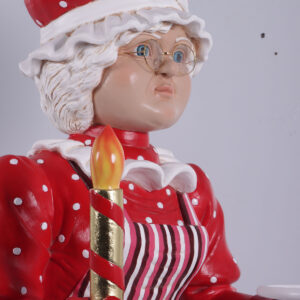 complete with a striped apron and frilly details