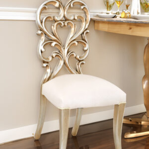 a multi step process of actually silver leafing the frames and layering and finishing techniques. The imported Taffeta Fabric offers a neutral balance to this amazing finishing. While this Chair is sold separately. it is often purchased in pairs for Balance. The Platine Collection offers wonderful options to expand your design and consider any of the Platine matching Upholstery and Occasional pieces from this top Quality Collection. All furniture is hand made and finished 1 piece at a time.