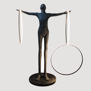 Designed to a grand scale the statue is impressive. Standing 84 inches tall with out stretched arms holding LED light rings creating an interesting glow of light around the sculpture creating interesting highlights and shading