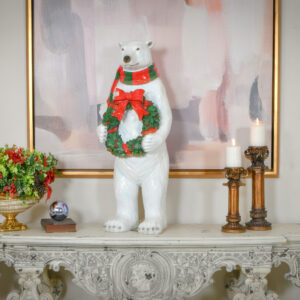donning a vibrant red and green scarf