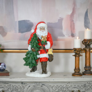 depicting Santa merrily carrying a Christmas tree. Standing at 24 inches tall and measuring 13.5 inches in width and 12 inches in depth