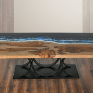 each Artistic Floating Teak Table is unique.  Natural pieces of teak wood are sealed in epoxy for a beautiful floating wood effect.  This special piece is inspired by the oceans crashing against sandy beaches of driftwood.  Appropriate height to be used in the dining room the Artistic Floating Teak Table with Stainless Base can seat 8.  Perhaps consider using the coastal inspired piece as a conference table.  The stainless steel base is a simple form with a polished chrome finish that completes the stylish design of the Artistic Floating Teak Table while providing proper support.  Each table and base are made to order requiring advanced order if you have a deadline you wish to meet.  Please contact customer service for more information regarding placing an order.