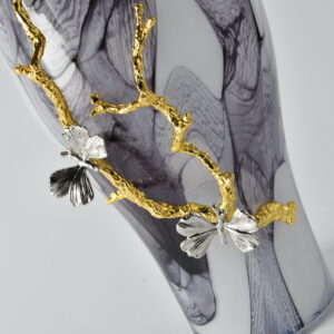 the Small Marble Bloom Vase is a refined piece of art. Featuring elegant vase in a smoky marble swirl finish
