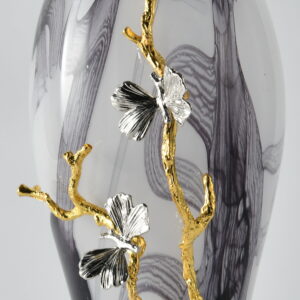 the Midnight Swirl Vase showcases a striking