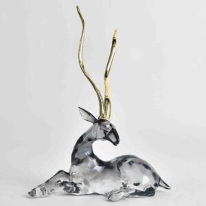 Embrace serene elegance with the Stag with Gold Antlers Laying Down